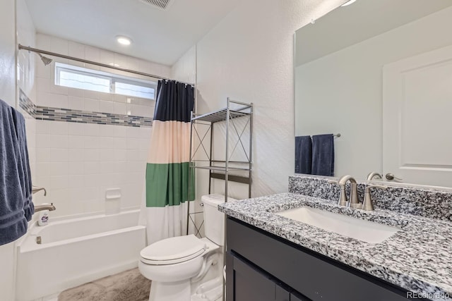 full bathroom featuring vanity, toilet, and shower / bath combo with shower curtain