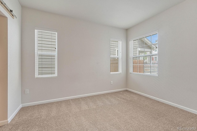 view of carpeted empty room