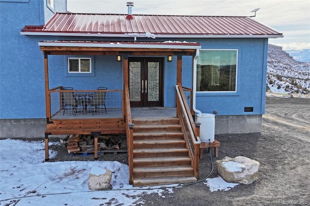 view of front facade featuring french doors