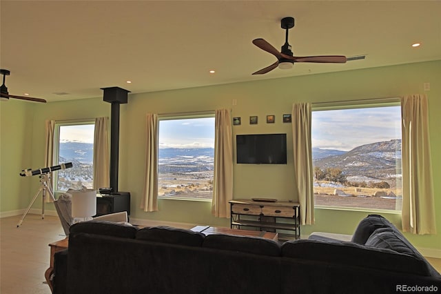 living room featuring ceiling fan