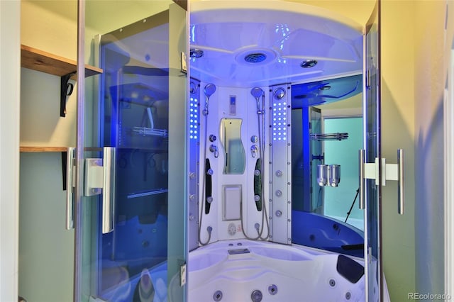 bathroom with shower / bathing tub combination