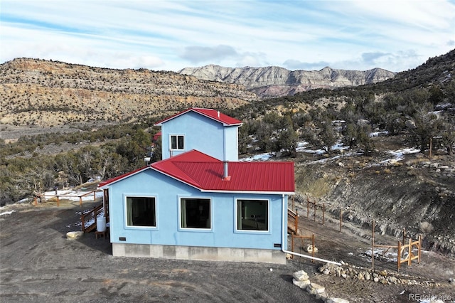 exterior space featuring a mountain view