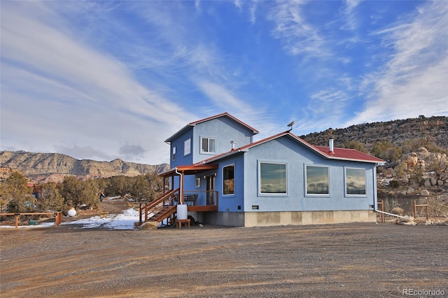 view of front facade with a mountain view