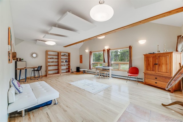 1002 County Road 99, Black Hawk, CO 80422 - sitting room with lofted ceiling, light wood-style flooring, and a baseboard radiator