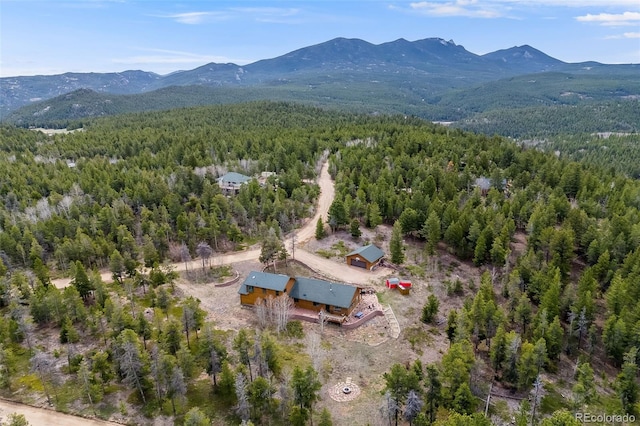 1002 County Road 99, Black Hawk, CO 80422 - view of property location featuring a forest and a mountainous background