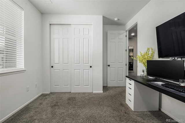 10595 Boston St, Commerce City, CO 80640 - office area with dark carpet and baseboards