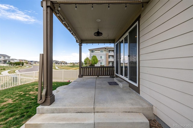 10595 Boston St, Commerce City, CO 80640 - view of patio / terrace with a residential view