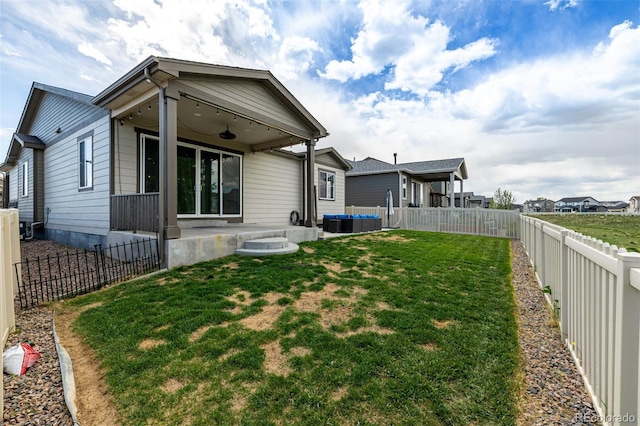 10595 Boston St, Commerce City, CO 80640 - back of house featuring a patio area