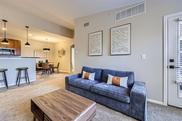 living room with light carpet