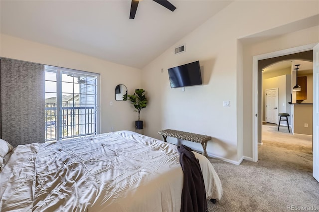 carpeted bedroom with ceiling fan, access to outside, and vaulted ceiling