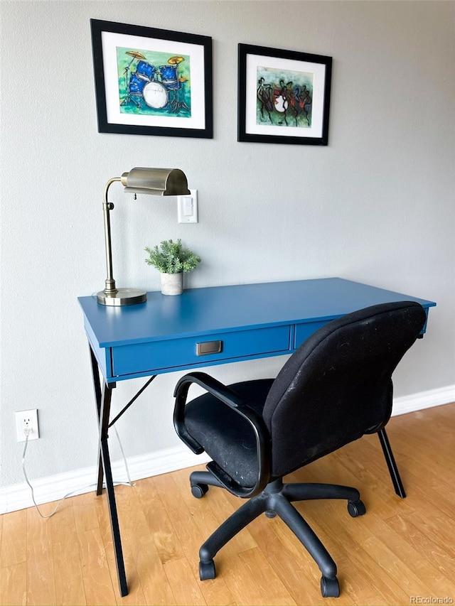 office with hardwood / wood-style flooring