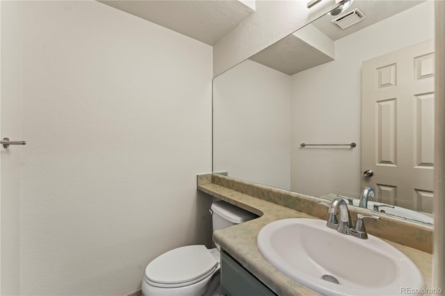 1344 Firefly Cir, Colorado Springs, CO 80916 - bathroom with vanity and toilet