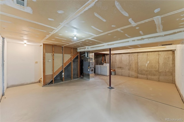 1344 Firefly Cir, Colorado Springs, CO 80916 - unfinished below grade area with washing machine and dryer and stairs