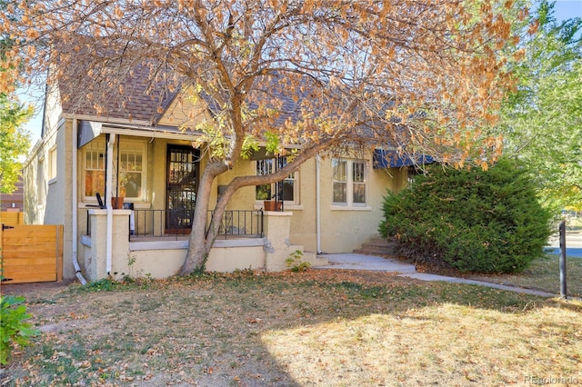 2103 S Lafayette St, Denver, CO 80210 - view of front of home featuring stucco siding