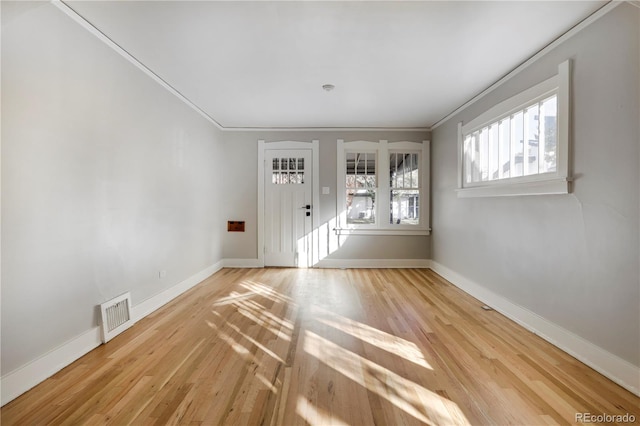 2103 S Lafayette St, Denver, CO 80210 - entrance foyer featuring wood finished floors and crown molding