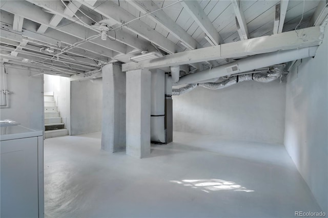 2103 S Lafayette St, Denver, CO 80210 - unfinished below grade area featuring washer / clothes dryer and stairway