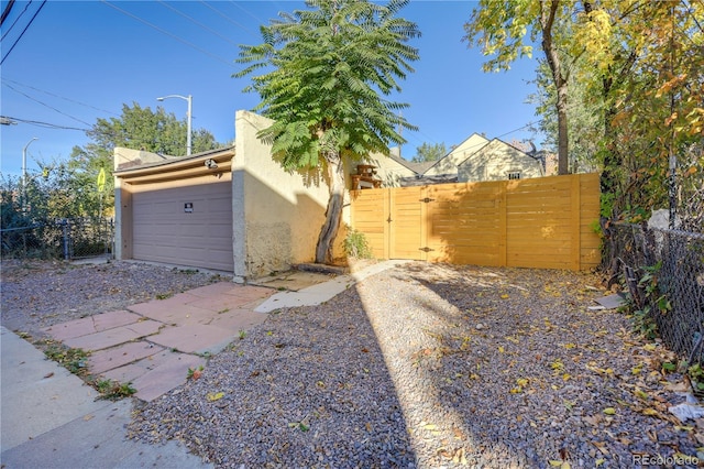2103 S Lafayette St, Denver, CO 80210 - garage with a gate