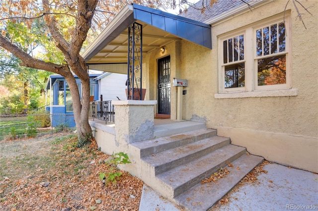 2103 S Lafayette St, Denver, CO 80210 - property entrance with stucco siding