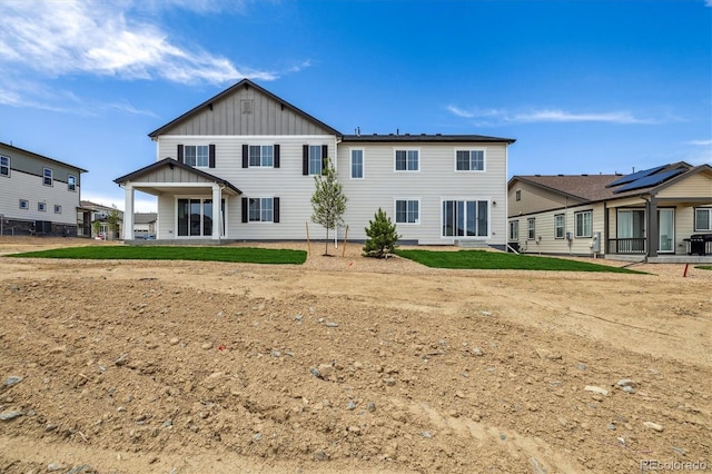 6636 N Nepal St, Aurora, CO 80019 - view of front of house featuring board and batten siding
