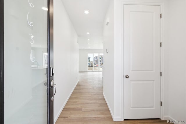 6636 N Nepal St, Aurora, CO 80019 - hallway featuring light wood-style flooring, baseboards, and recessed lighting