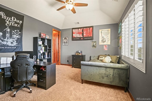 office featuring carpet, lofted ceiling, and ceiling fan