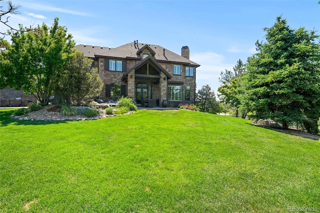 view of front of home with a front lawn