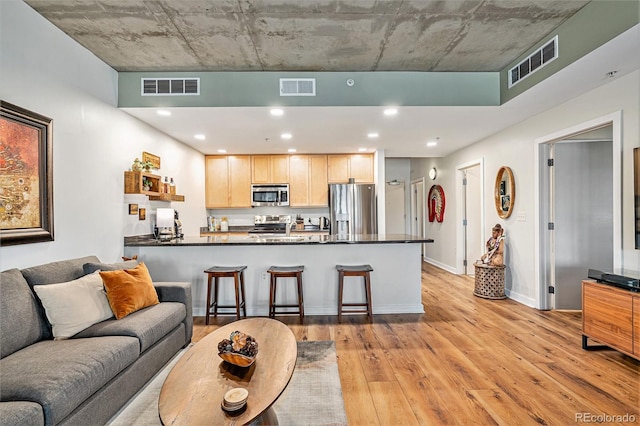 living room featuring light wood-type flooring