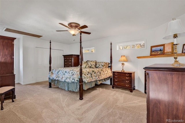 bedroom with light carpet and ceiling fan