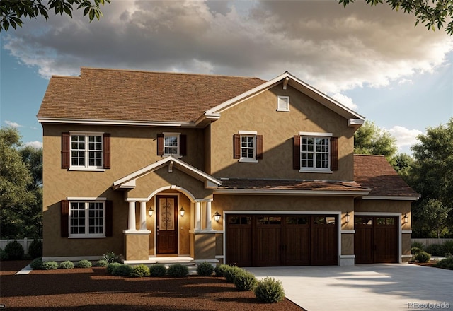 view of front of home with a garage