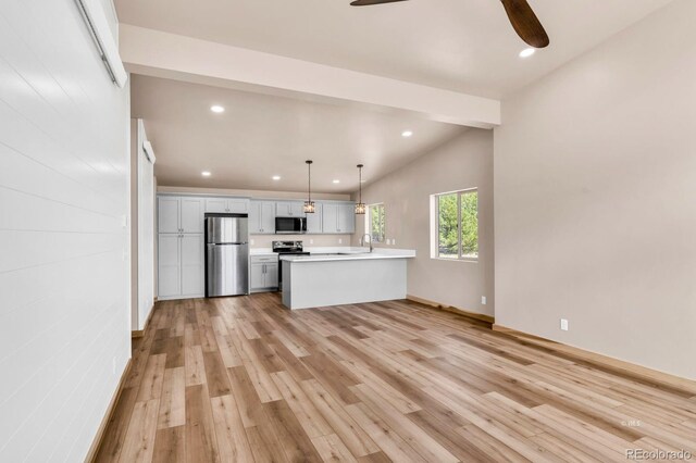 388 14th Trl, Cotopaxi, CO 81223 - kitchen with appliances with stainless steel finishes, a ceiling fan, a peninsula, light countertops, and recessed lighting