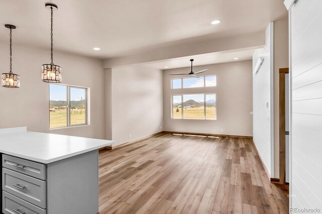 388 14th Trl, Cotopaxi, CO 81223 - unfurnished dining area with ceiling fan, light wood finished floors, recessed lighting, a chandelier, and baseboards