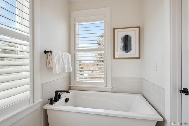 full bathroom with a garden tub