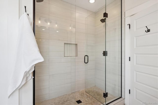 bathroom featuring a stall shower