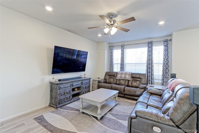 9448 Richfield St, Commerce City, CO 80022 - living area featuring light wood-type flooring, a ceiling fan, recessed lighting, and baseboards
