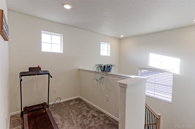 9448 Richfield St, Commerce City, CO 80022 - exercise room with carpet flooring, plenty of natural light, baseboards, and recessed lighting