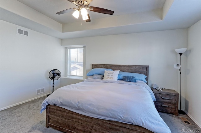 9448 Richfield St, Commerce City, CO 80022 - bedroom featuring carpet flooring, a tray ceiling, baseboards, and a ceiling fan