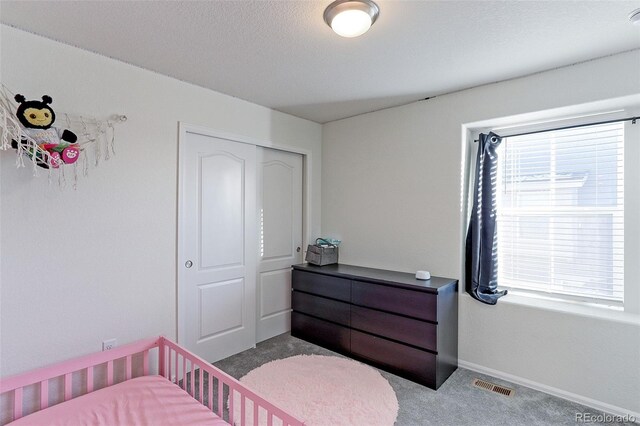 9448 Richfield St, Commerce City, CO 80022 - carpeted bedroom featuring multiple windows and baseboards