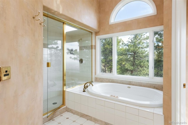 1426 Rembrandt Rd, Boulder, CO 80302 - full bath featuring a shower stall, a garden tub, and tile patterned floors