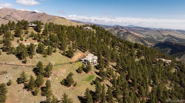 1426 Rembrandt Rd, Boulder, CO 80302 - aerial overview of property's location with a mountain backdrop