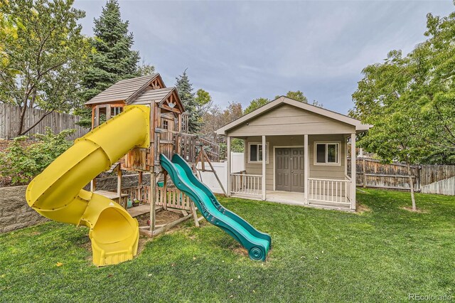 view of playground featuring a lawn