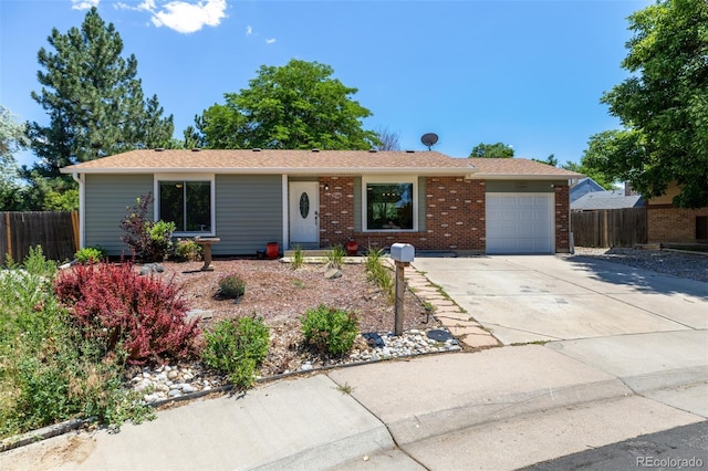 1394 S Zeno St, Aurora, CO 80017 - ranch-style home featuring a garage, concrete driveway, and brick siding