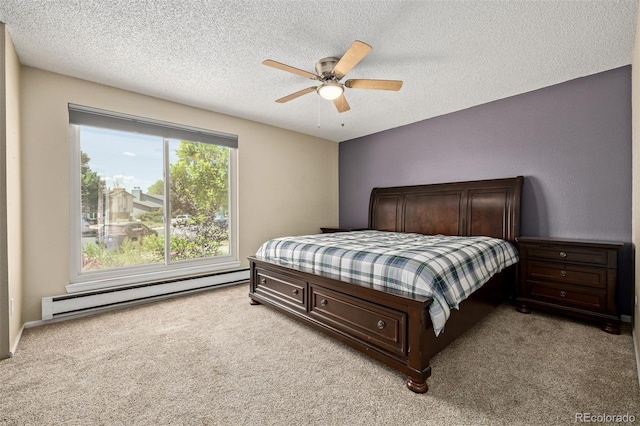 1394 S Zeno St, Aurora, CO 80017 - bedroom with a baseboard heating unit, light colored carpet, a textured ceiling, and a ceiling fan