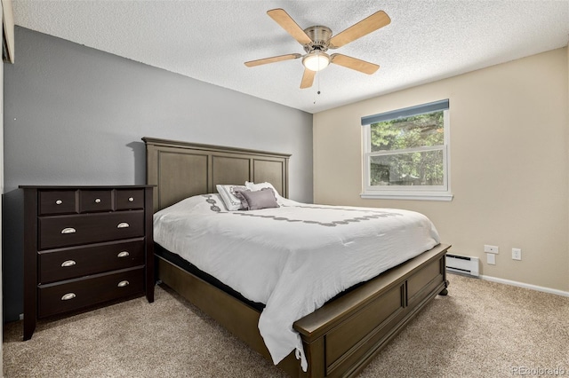 1394 S Zeno St, Aurora, CO 80017 - bedroom with light colored carpet, a baseboard heating unit, ceiling fan, and a textured ceiling