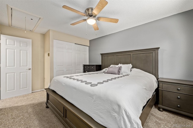 1394 S Zeno St, Aurora, CO 80017 - bedroom with light carpet, attic access, a closet, and ceiling fan