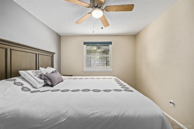 1394 S Zeno St, Aurora, CO 80017 - bedroom featuring a textured ceiling and a ceiling fan