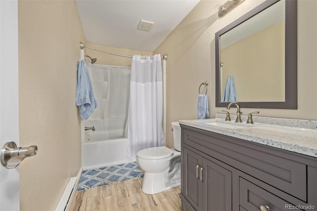 1394 S Zeno St, Aurora, CO 80017 - full bathroom featuring wood finished floors, vanity, and shower / bathtub combination with curtain