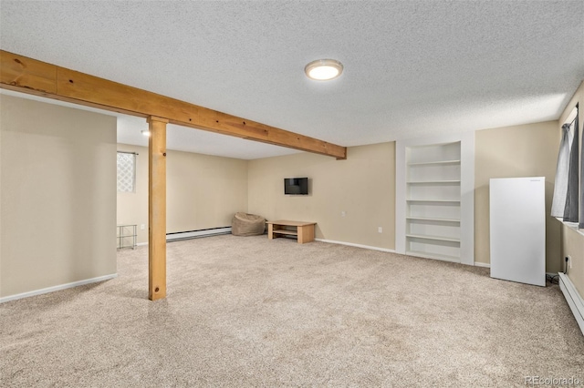 1394 S Zeno St, Aurora, CO 80017 - finished basement featuring a baseboard radiator, carpet flooring, built in features, and a textured ceiling