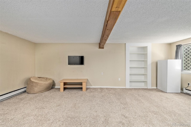 1394 S Zeno St, Aurora, CO 80017 - sitting room featuring a textured ceiling, carpet, built in shelves, baseboard heating, and beam ceiling