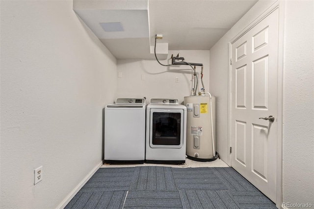 1394 S Zeno St, Aurora, CO 80017 - laundry room with electric water heater and independent washer and dryer