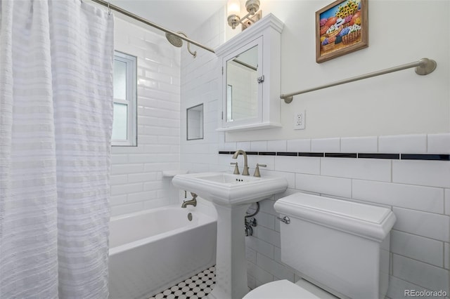 860 Magnolia St, Denver, CO 80220 - bathroom featuring tile walls and shower / bathtub combination with curtain